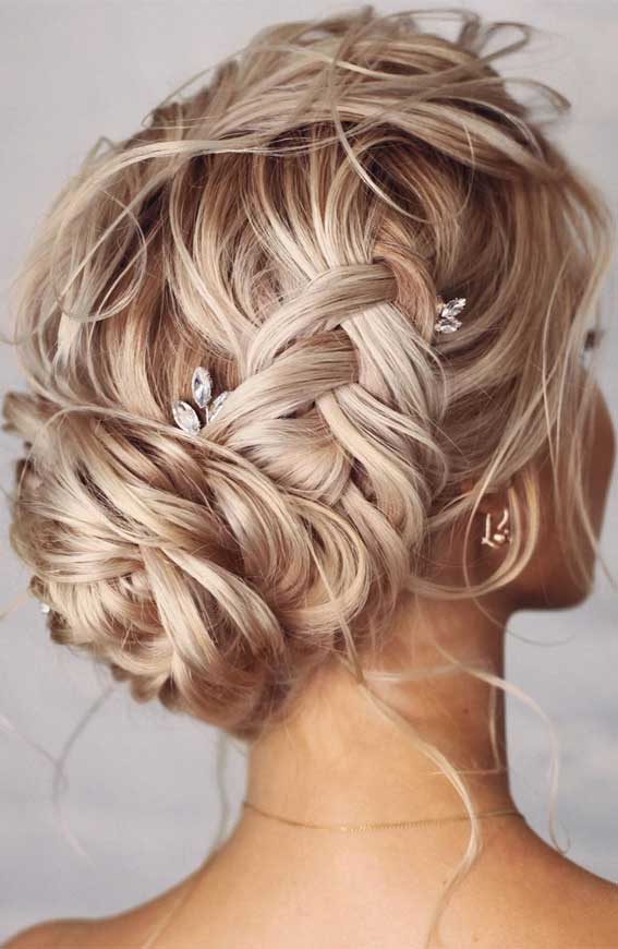halo braid, halo braided updo, bridal braided updo, updo hairstyle for elegant look, hairstyle ideas , updo, wedding hair down, half up half down, wedding updo hairstyle ,textured updo #updos #weddinghair #bridalhairstyles elegant bridal updo, elegant wedding hairstyle , elegant updos