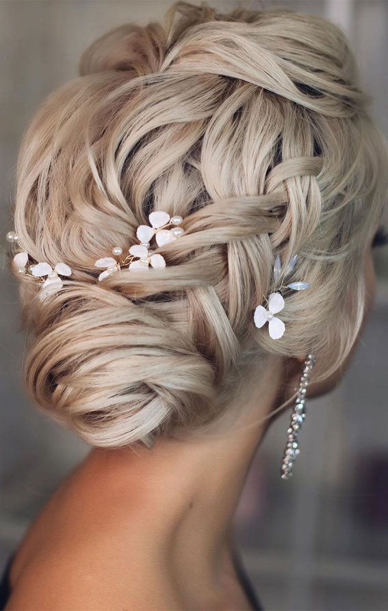 braided updo, halo braid, halo braided updo, bridal braided updo, updo hairstyle for elegant look, hairstyle ideas , updo, wedding hair down, half up half down, wedding updo hairstyle ,textured updo #updos #weddinghair #bridalhairstyles elegant bridal updo, elegant wedding hairstyle , elegant updos