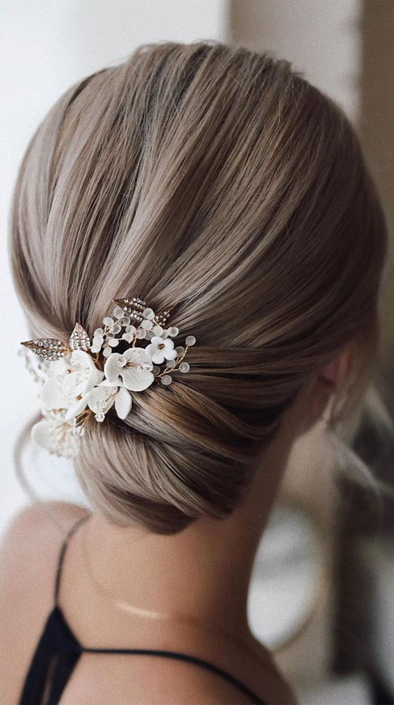 updo hairstyles for medium length to long hair #weddingupdos low updo hairstyle for elegant look, hairstyle ideas , updo,  wedding updo hairstyle ,textured updo #updos #weddinghair #bridalhairstyles wedding hairstyle 