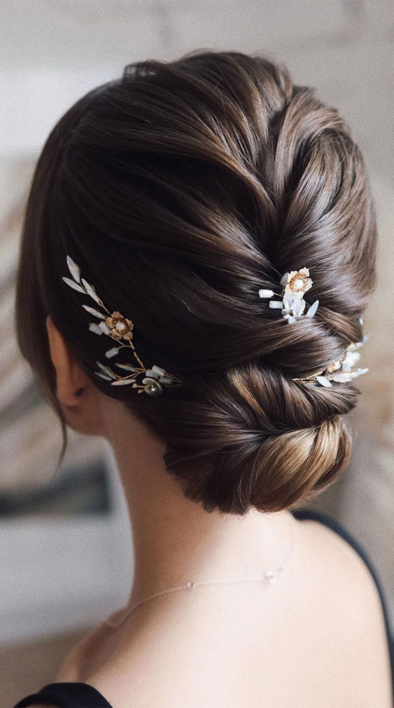 updo hairstyles for medium length to long hair #weddingupdos low updo hairstyle for elegant look, hairstyle ideas , updo,  wedding updo hairstyle ,textured updo #updos #weddinghair #bridalhairstyles wedding hairstyle 
