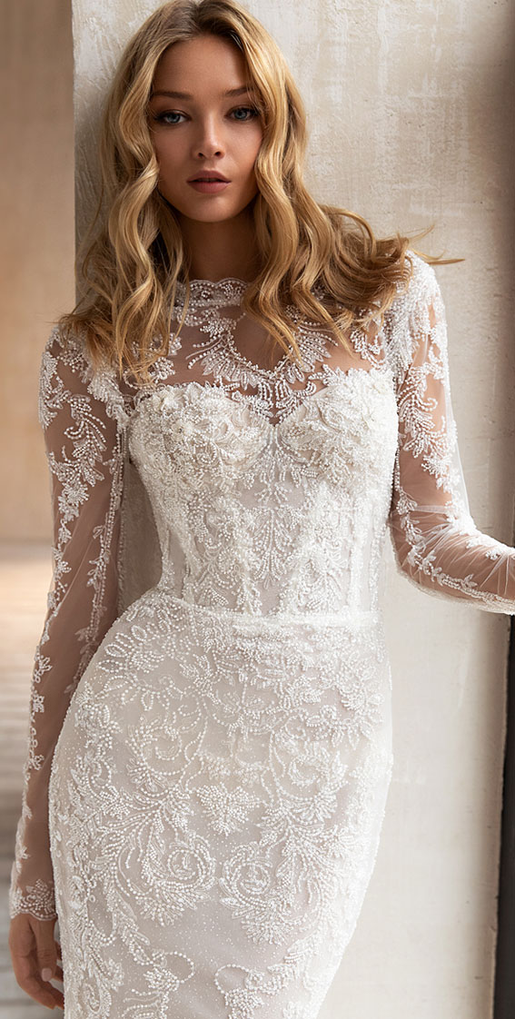 eva lendel wedding dress, eva lendel wedding dresses, eva lendel bridal, eva lendel bridal 2021, elegant wedding dress, long sleeve floral heavy embellishment with pearl and beads sheath wedding dress with short train with removable skirt #wedding #weddinggown #weddingdresses #weddingdress #bridalgown #bride