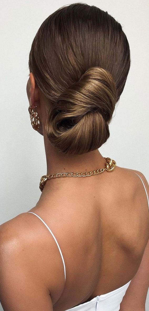 39 The most romantic wedding hair dos to get an elegant look : Twisted Low Bun