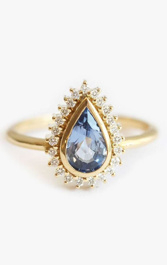 blue sapphire halo engagement ring, engagement ring, engagement ring ideas, oval engagement ring, best engagement rings , best engagement rings 2020