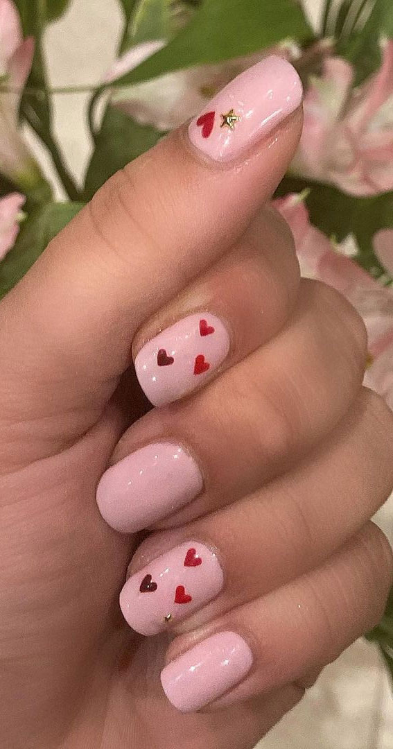 red love heart pink nails, red love heart valentine's day nails, valentines nails 2021, valentine's day nails 2021, valentines nails, pink and red love heart nails, love heart nail ideas