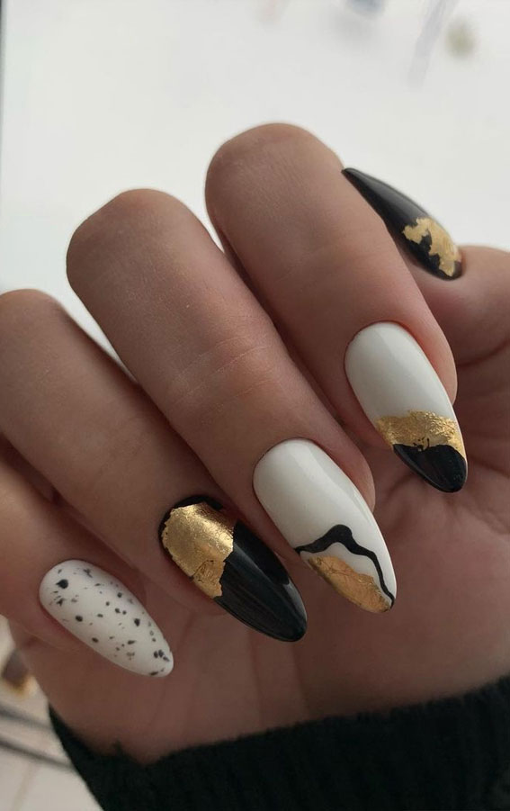 Most Beautiful Nail Designs You Will Love To wear In 2021 : Black, gold, white and speckled nails