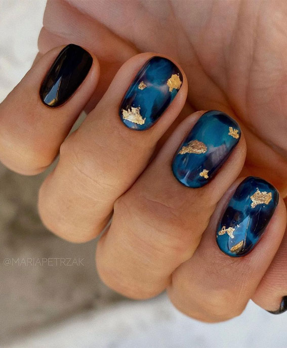 Most Beautiful Nail Designs You Will Love To wear In 2021 : Dark blue nails with gold leaf