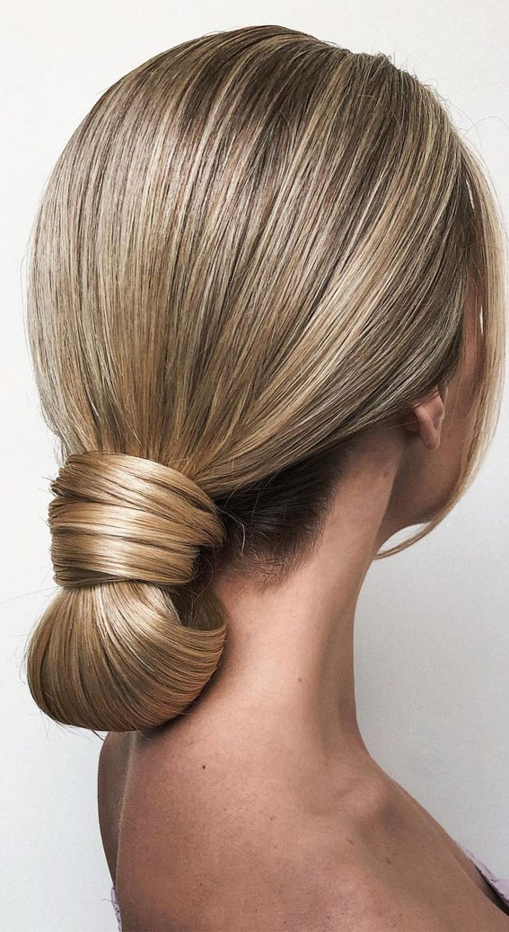 Sophisticated updos for any occasion –  Pretty low bun for sleek look