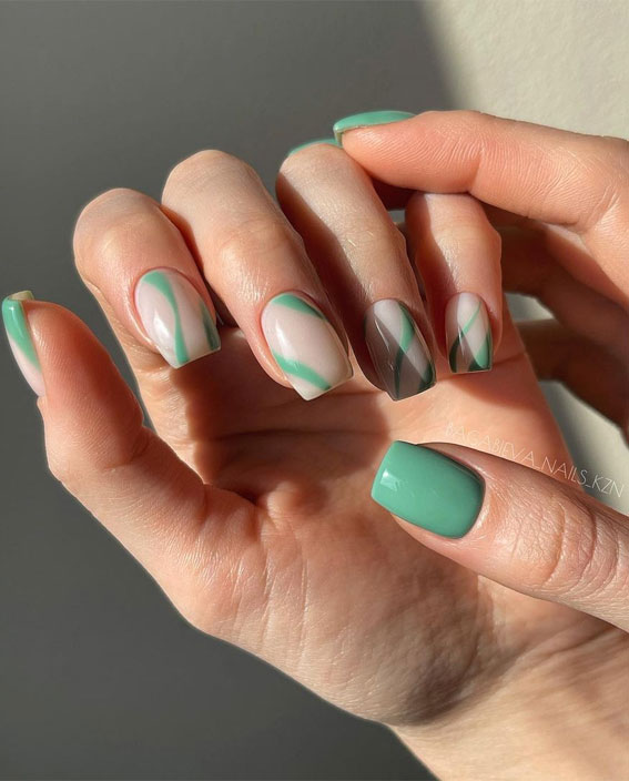 The Prettiest Summer Nail Designs We’ve Saved : Mixed Green & Swirl on Nude Nails