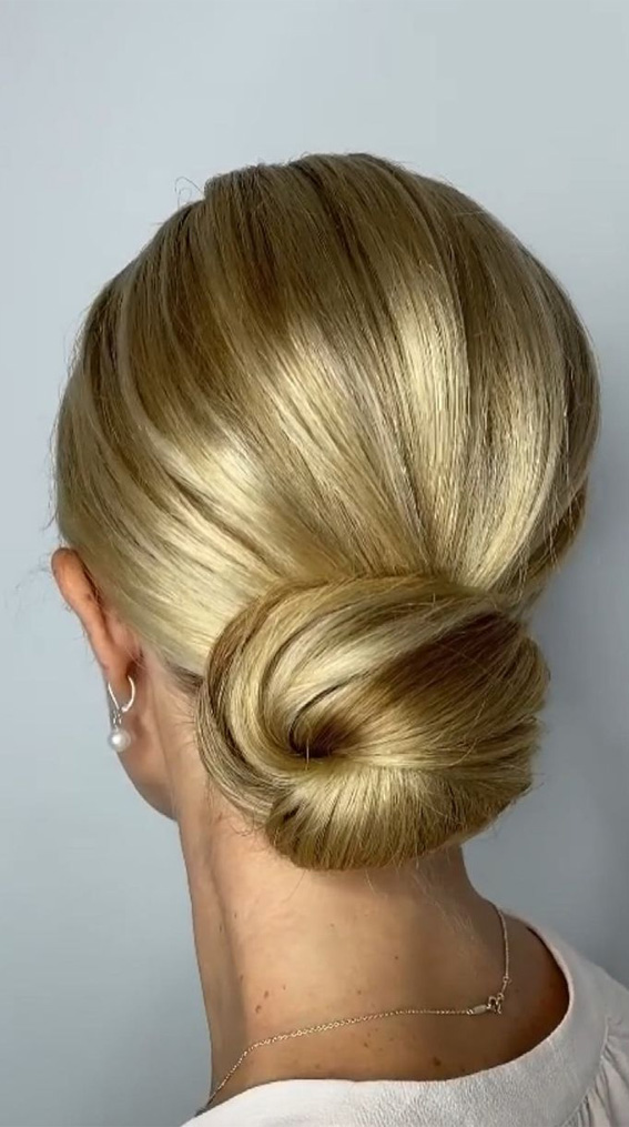 75 Trendiest Updo Hairstyles 2021 : Sophisticated Textured Low Bun For Long Hair