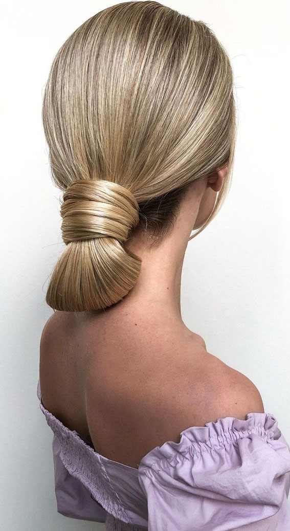 Sophisticated updos for any occasion – Sleek ponytail bun