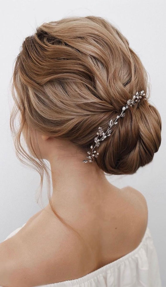 75 Trendiest Updo Hairstyles 2021 : Sophisticated twisted low bun