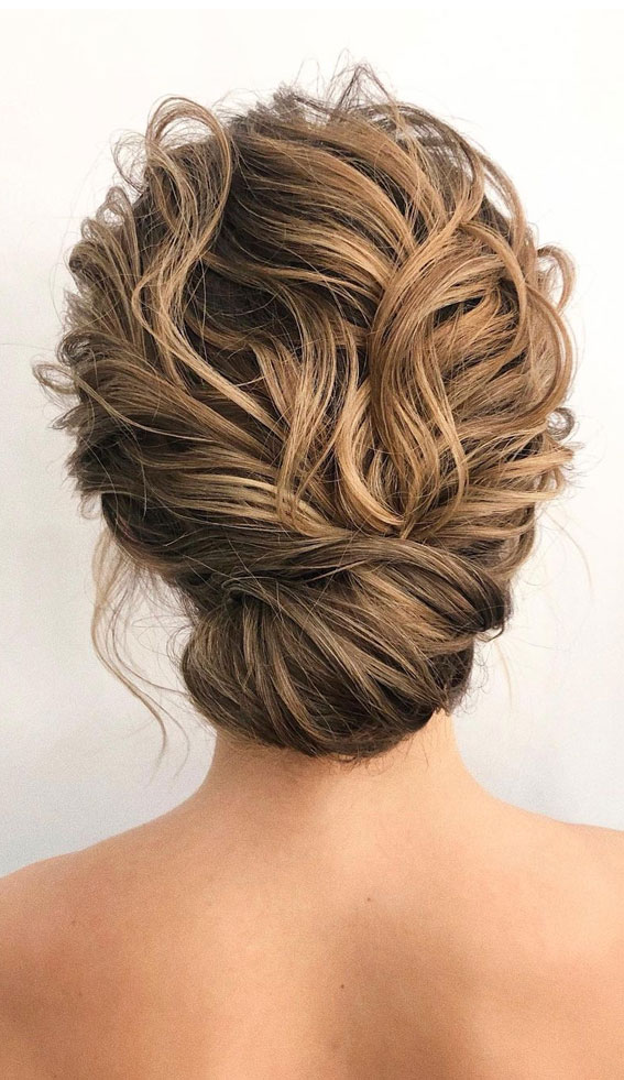 I present to you, The Textured Low Bun 💕 A staple in my signature styles,  and for good reason! A splash of movement, lots of volume a... | Instagram