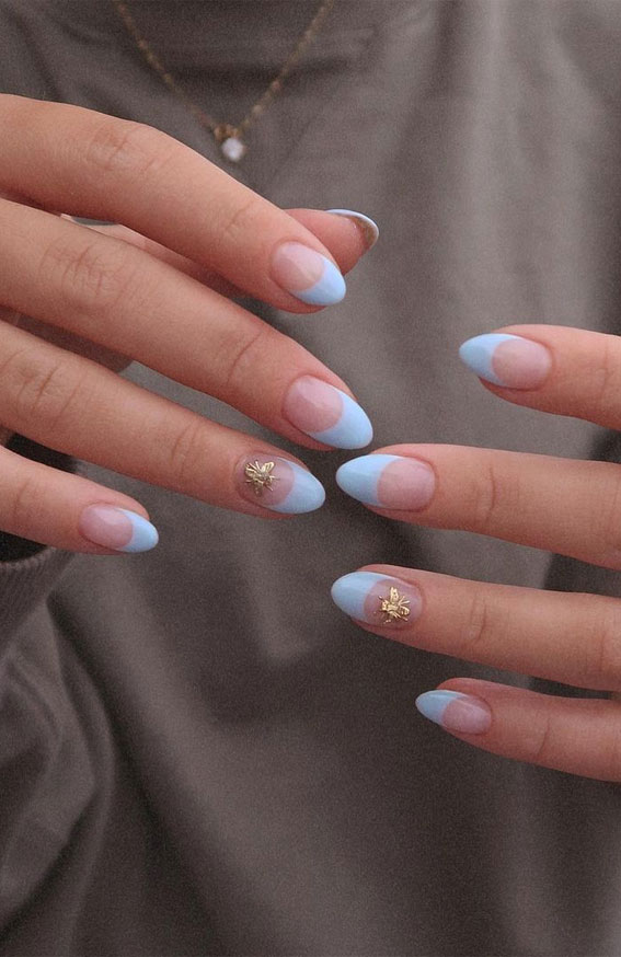 french tip nails, baby blue french tips, blue french tip nails, french tip nailsshort, french tip nails with gold bee, baby blue colored french tip nails, summer french tip nails 2021, french tip nails designs, summer french tip nails design, french tip nails 2021, blue french tip nails