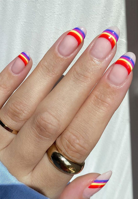 rainbow tip nails, colorful tip nails, negative space nails, colorful french nails, green and yellow on nude nails, natural color nails 2021, white summer nails 2021, summer nail ideas 2021, summer nail trends 2021, coffin summer nails 2021, cute summer nails 2021, bright summer nails 2021, bright summer nails 2021