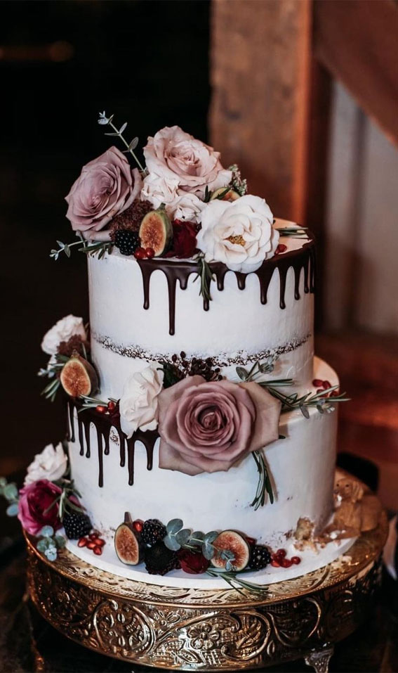 semi-naked wedding cake with chocolate drizzle, two-tiered wedding cake, rustic wedding cake, simple rustic wedding cake, best wedding cakes 2021