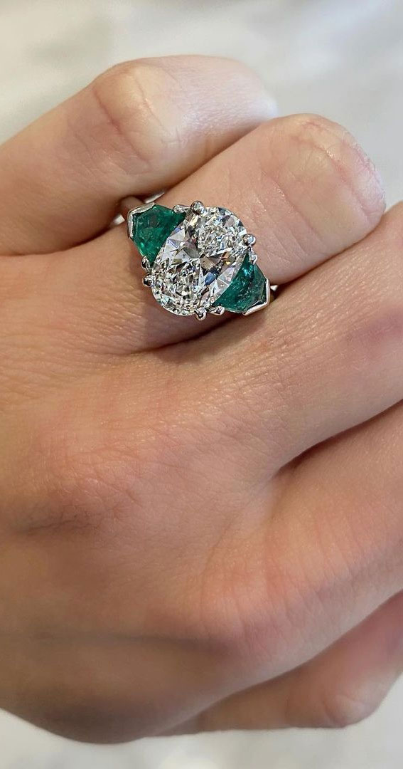 30 Oval Engagement Rings The Perfect Choice : Oval with green emerald bullet side stones