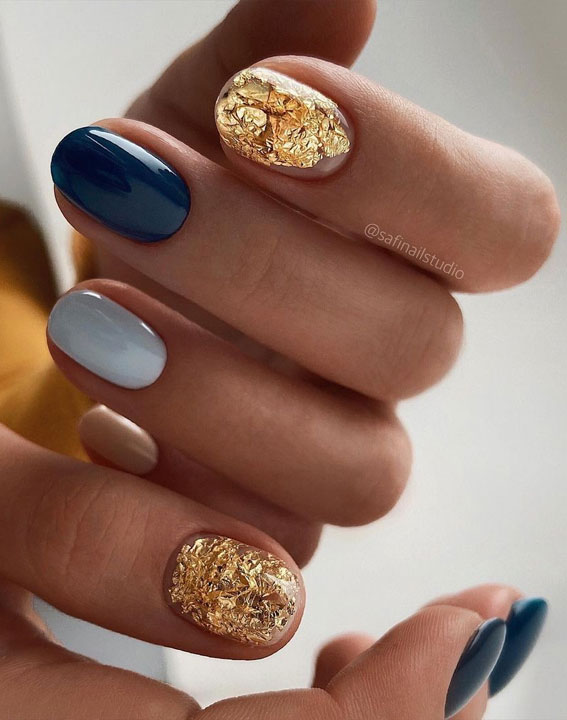 shades of blue and gold nails, multicolored fall nails, different color nails on each finger, autumn nail colors