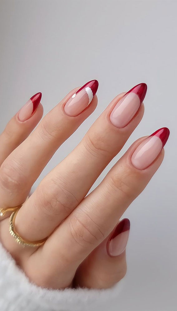 Closeup of a Red Manicure and a Feather Design on Almond-shaped Nails Stock  Photo - Image of feather, shape: 201063620