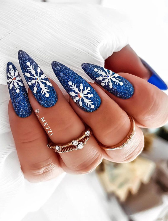 25 Pretty Holiday Nail Art Designs 2021 : Snowflake on Shimmery Blue Stiletto Nails