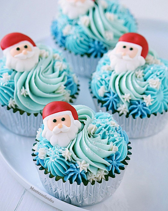 Festive Cupcakes to Add to Your Holiday Table : Santa on Blue Buttercream Cupcakes