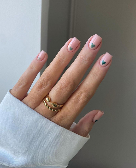 42 Cute Valentine’s Day Nails for 2022 : Nude Pink Gel Nails with Green Hearts
