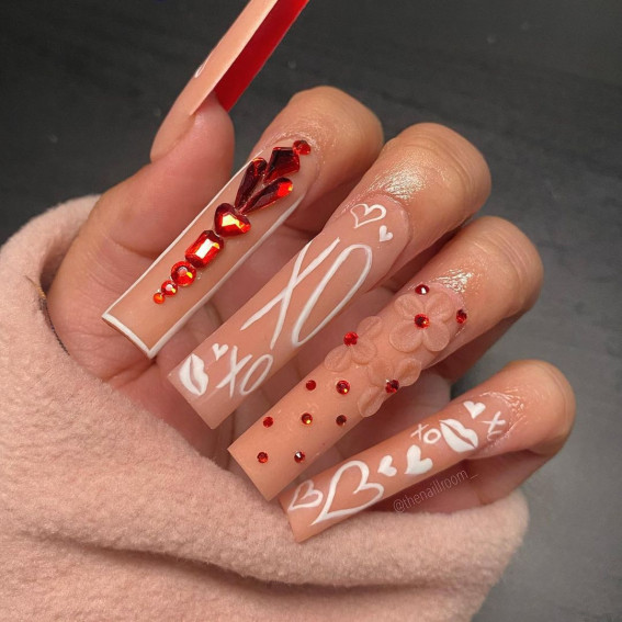 42 Cute Valentine’s Day Nails for 2022 : Nude Nail Art with Hearts + Kisses