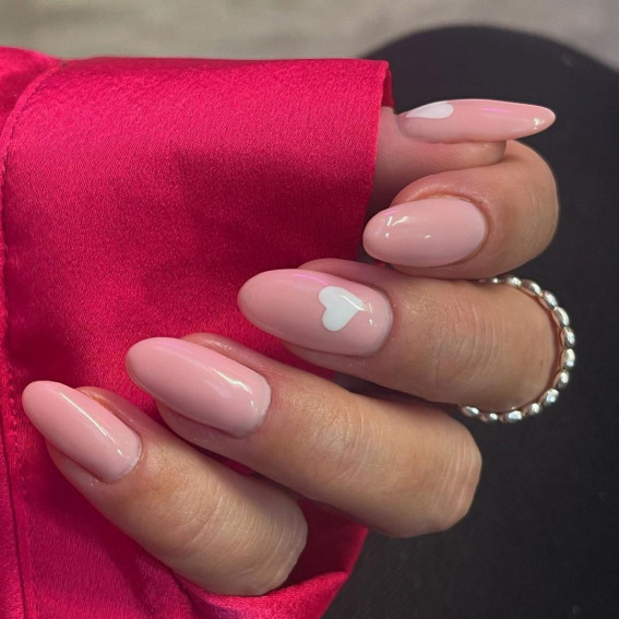 nude pink nails with white heart,  valentine's day nails, valentines nails 2022, valentines day nails 2022, valentines nails acrylic, heart nails 2022, heart nails, pink nails, valentines gel nails, nail art designs 2022