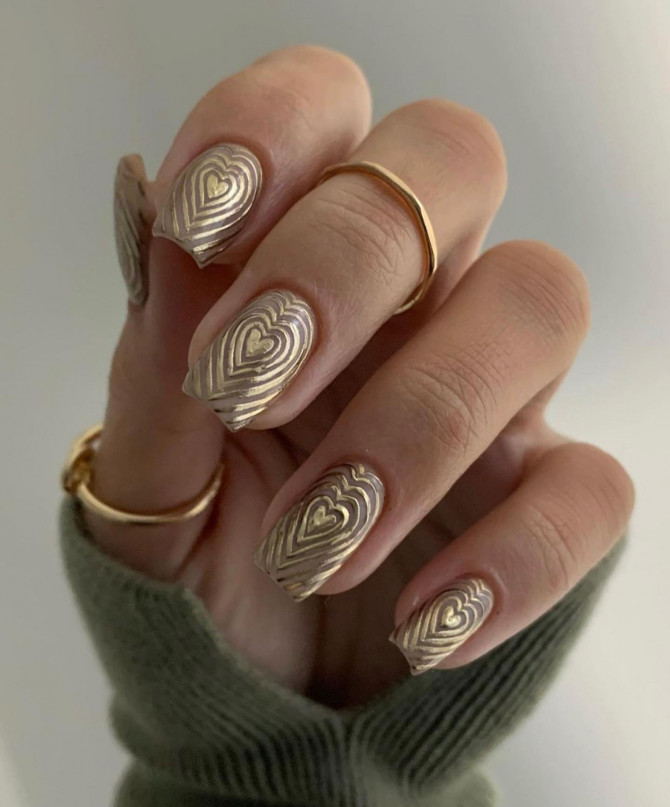 40 Best Valentine’s Day Nail Designs : Layered Gold Heart Nails