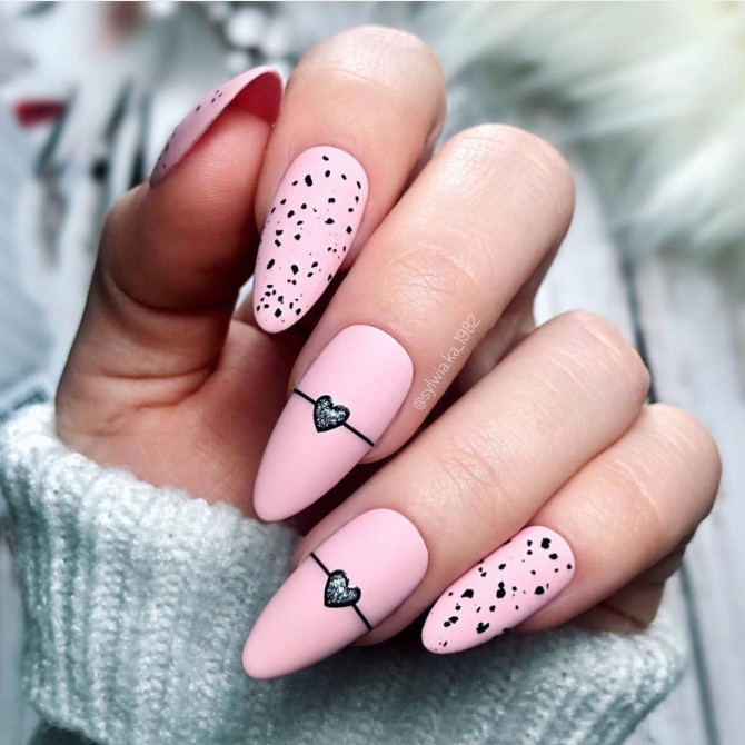42 Insanely Cute Valentine’s Day Nails : Matte Pink Almond Nails with Black Heart
