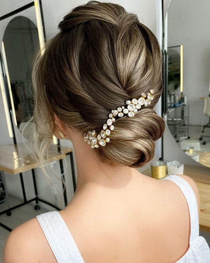 40 Beautiful Updo Hairstyles For 2022 : Textured Twist Low Bun