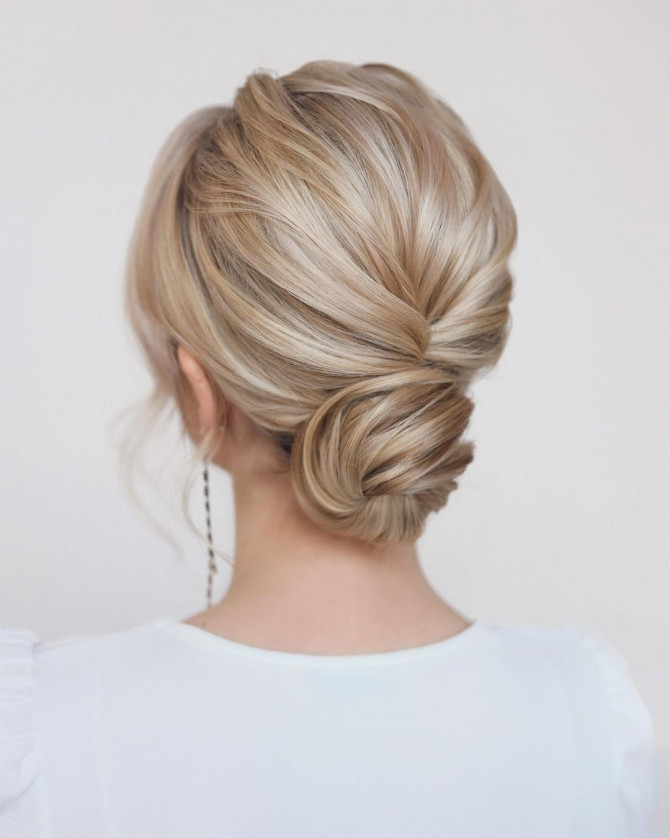 40 Beautiful Updo Hairstyles For 2022 : Blonde Knot Low Bun