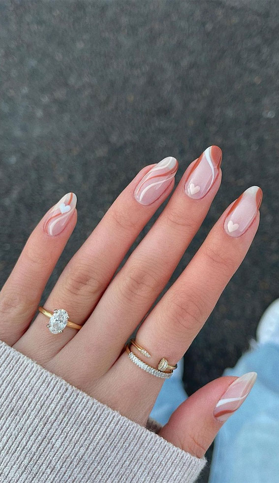 45 Trendy Spring Nails That’ll See Everywhere : Brown Swirl Almond Nails