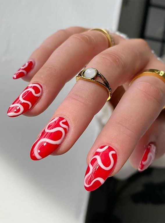 white swirl red nails, red nails, red nail art designs, summer nail colors
