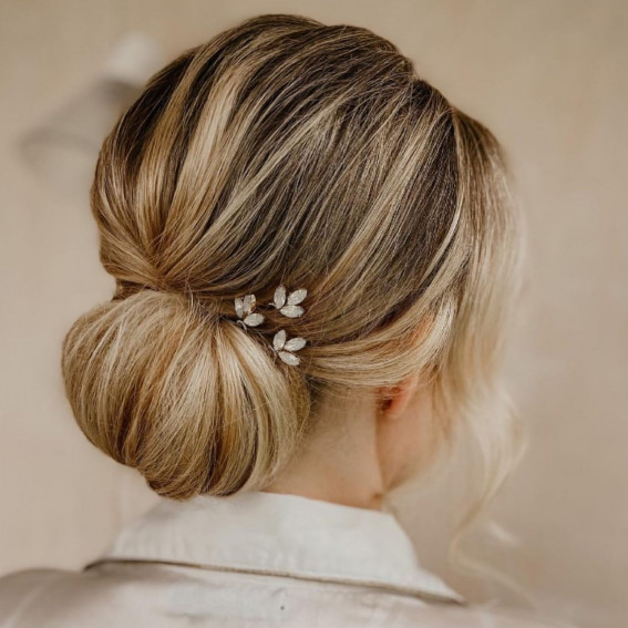 43 Stunning Updo Hairstyles 2022 : Low Bun with Floral Hair Pin