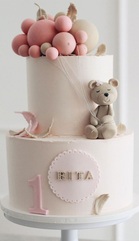 40 Cute First Birthday Cakes in 2022 : Neutral Two-Tiered Cake Topped with Bear