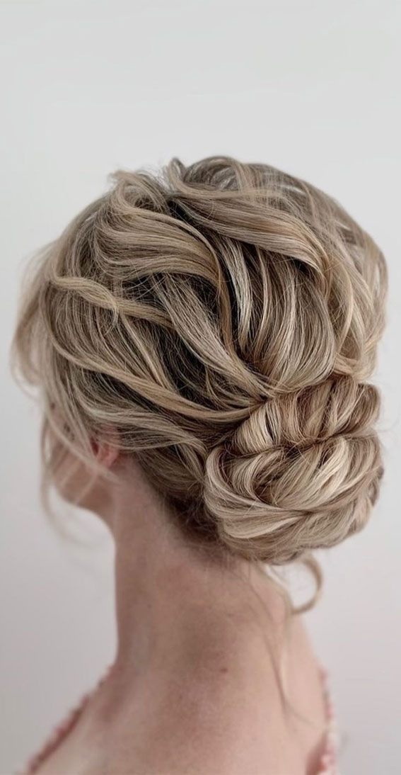 43 Stunning Updo Hairstyles 2022 : Dirty Blonde Twisted Low Bun