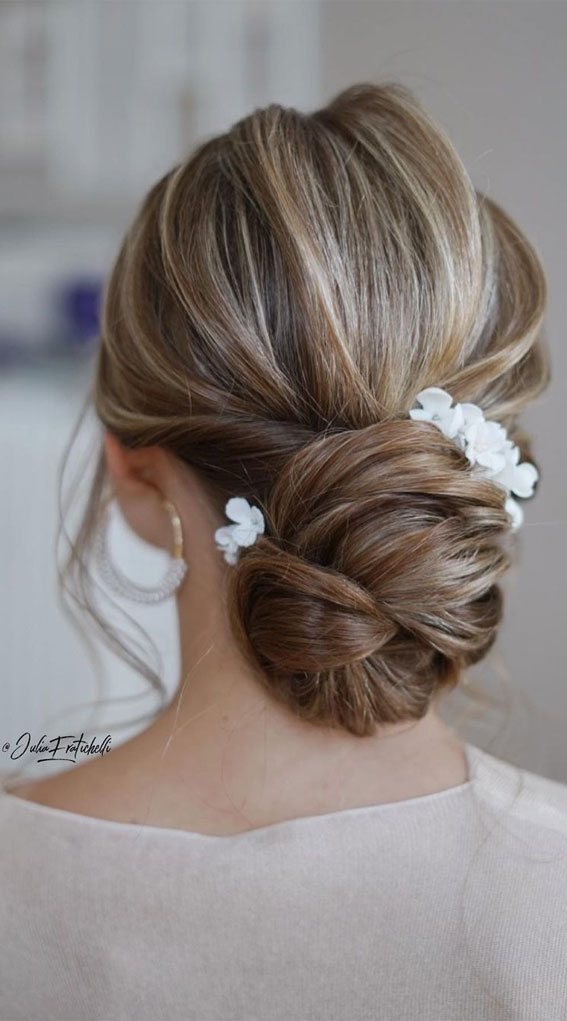 43 Stunning Updo Hairstyles 2022 : Knot Low Bun with Hair Pin