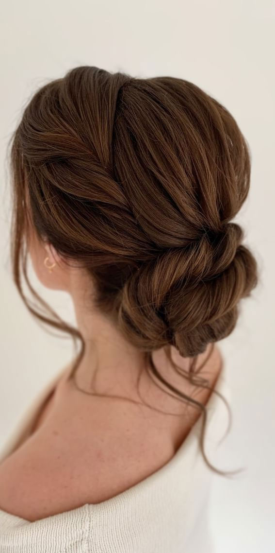 43 Stunning Updo Hairstyles 2022 : Brunette Twisted Low Bun