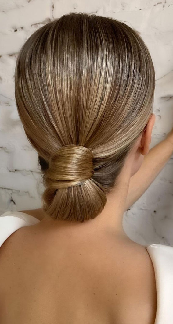 57 Different Wedding Hairstyles For Any Length : Sleek Wrap Low Bun