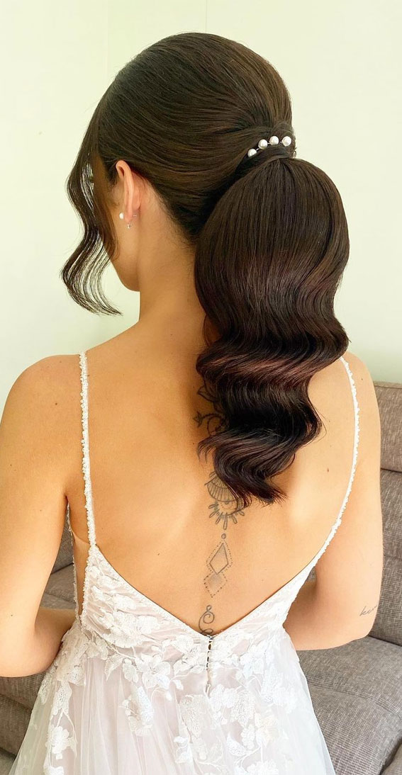57 Different Wedding Hairstyles For Any Length : Glam Wavy Ponytail Dark Hair