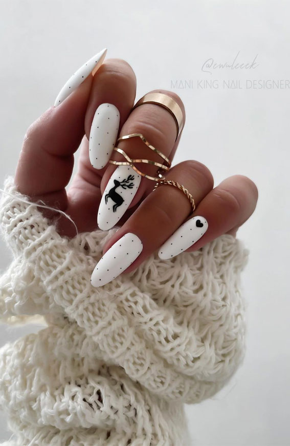 50+ Best Festive Christmas Nails : Reindeer White Almond Nails