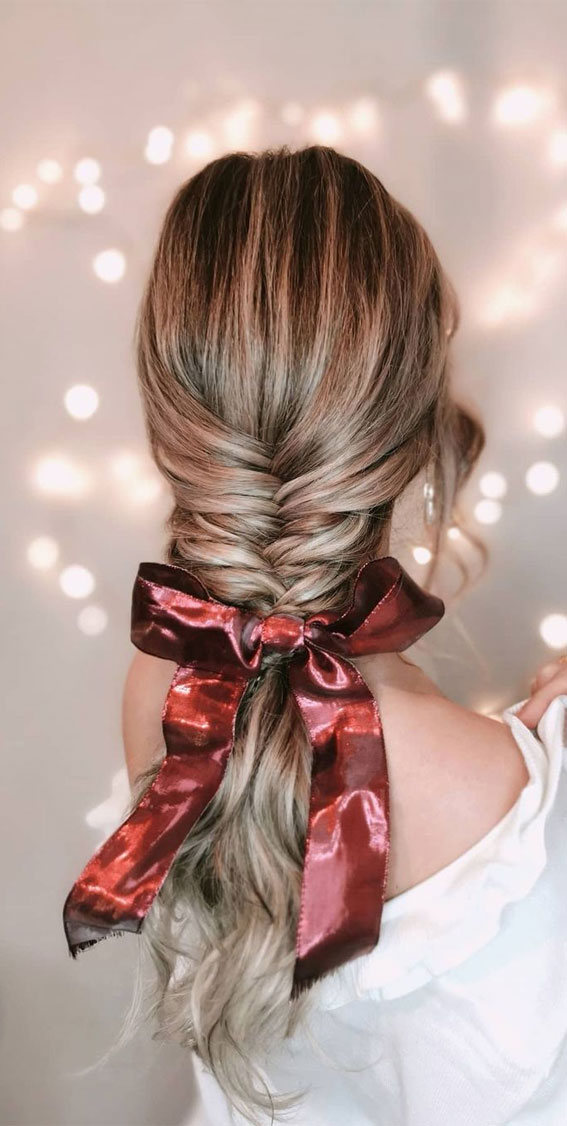 20+ Beautiful Hairstyles to wear in the festive season : Low Braid with Red Bow