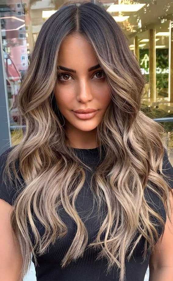 Long Parted Shag with Voluminous Messy Wavy Beach Texture and Bronzed  Brunette Balayage  The Latest Hairstyles for Men and Women 2020   Hairstyleology