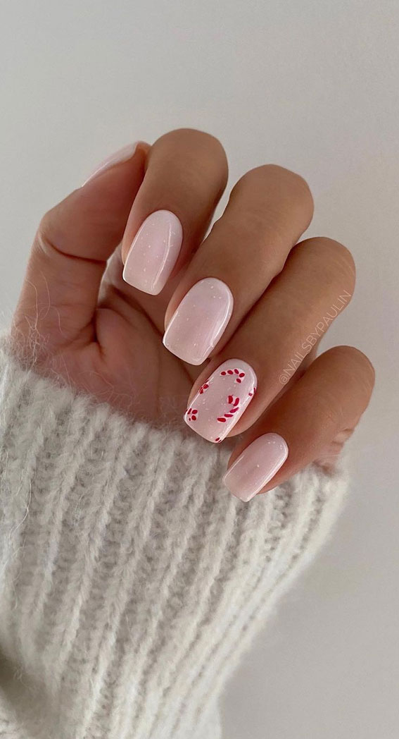 50+ Festive Holiday Nail Designs & Ideas : Simple Candy Cane Light Pink Nails