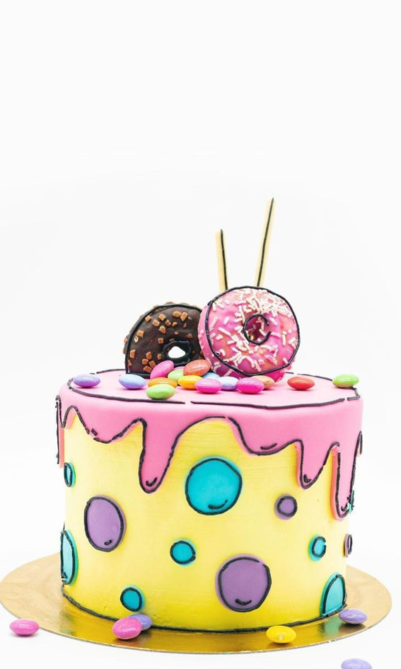 50+ Cute Comic Cake Ideas For Any Occasion : Yellow Comic Cake Topped with Donuts