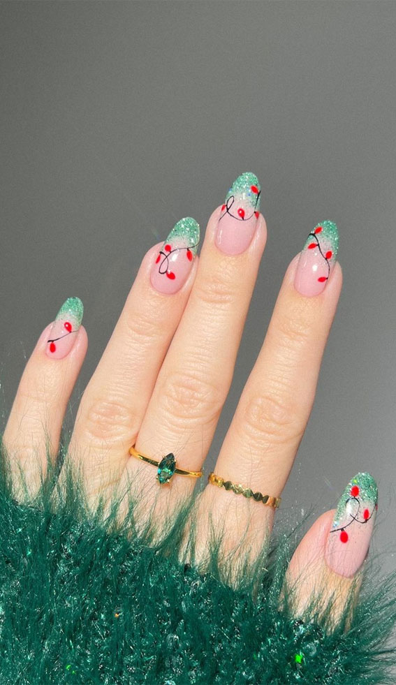 50+ Festive Holiday Nail Designs & Ideas : Shimmery Green Tip Christmas Nails + Lights