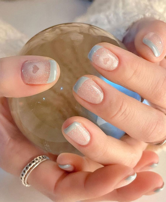 35 Best Valentine’s Day Nail Designs in 2023 : Light Blue Tips with Hearts