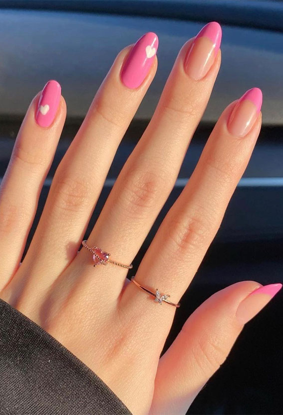 35 Best Valentine’s Day Nail Designs in 2023 : Pink Nails with White Heart