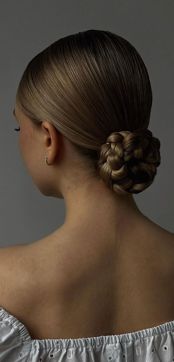 40 Updo Hairstyles Perfect For Any Occasion : Braided Sleek Low Bun
