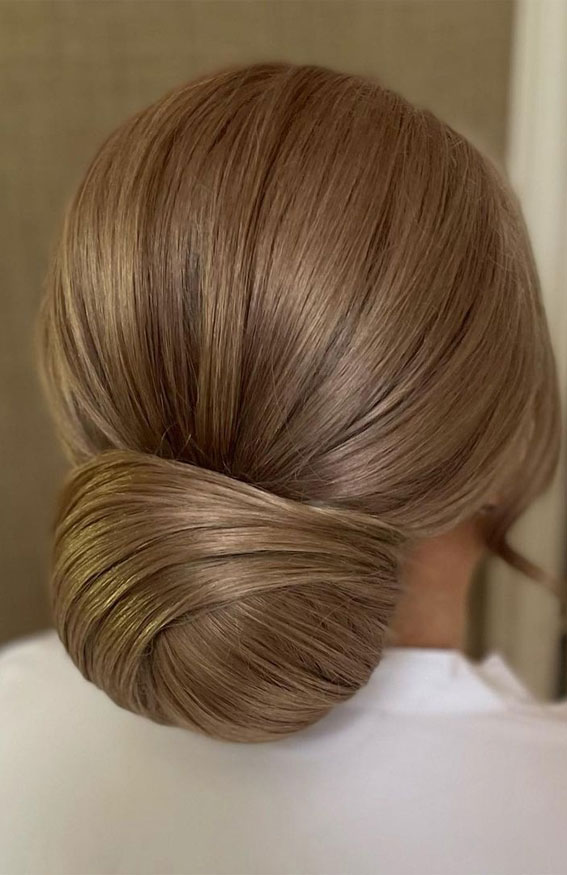40 Updo Hairstyles Perfect For Any Occasion : A sleek bun fit for a princess